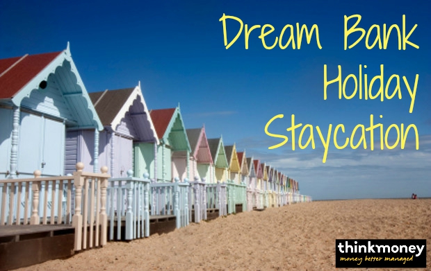 mersea beach huts and sandy beach in summer